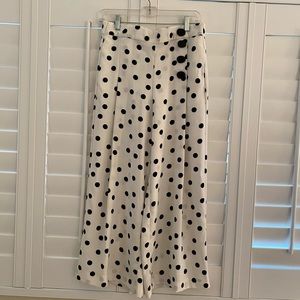 Black polka dot culottes.